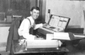 Lowell Observatory computer William Carrigan with calculating devices