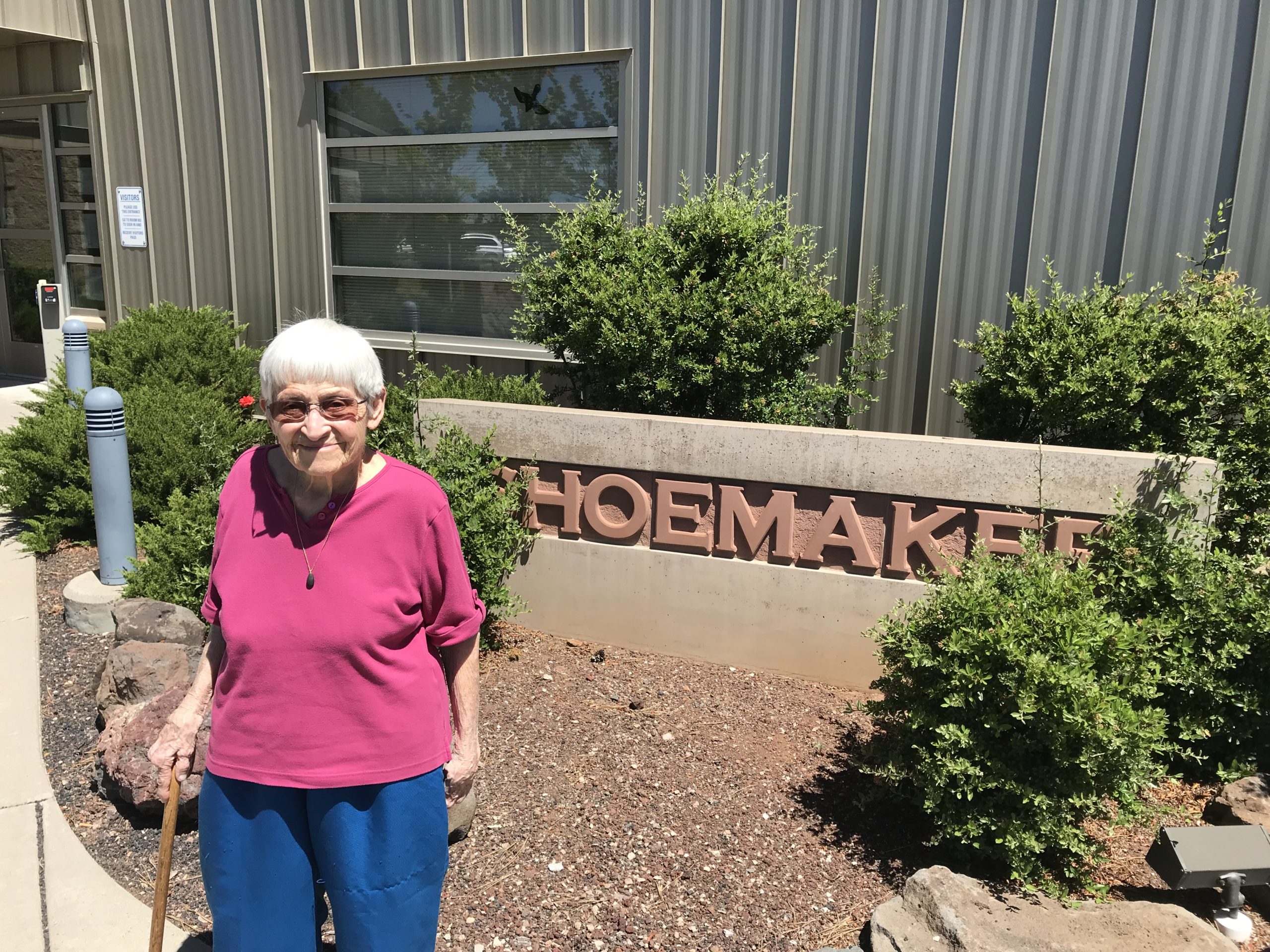 Carolyn Shoemaker in front of the building named in honor of her husband Gene, USGS Flagstaff Science Center.